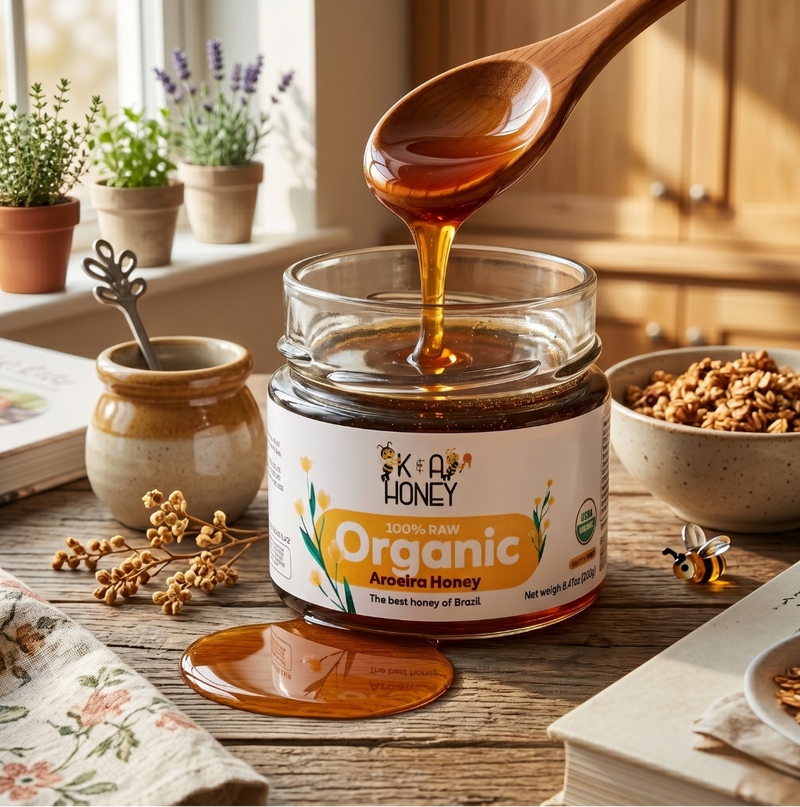 Jar of Aroeira Honey with a wooden spoon dripping honey, set on a kitchen counter.